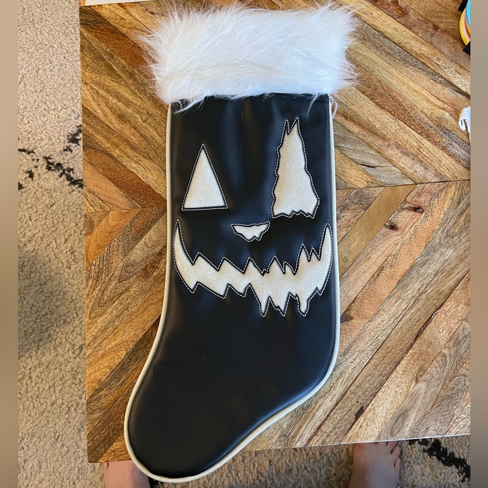 Love Pain and Stitches black leather stocking